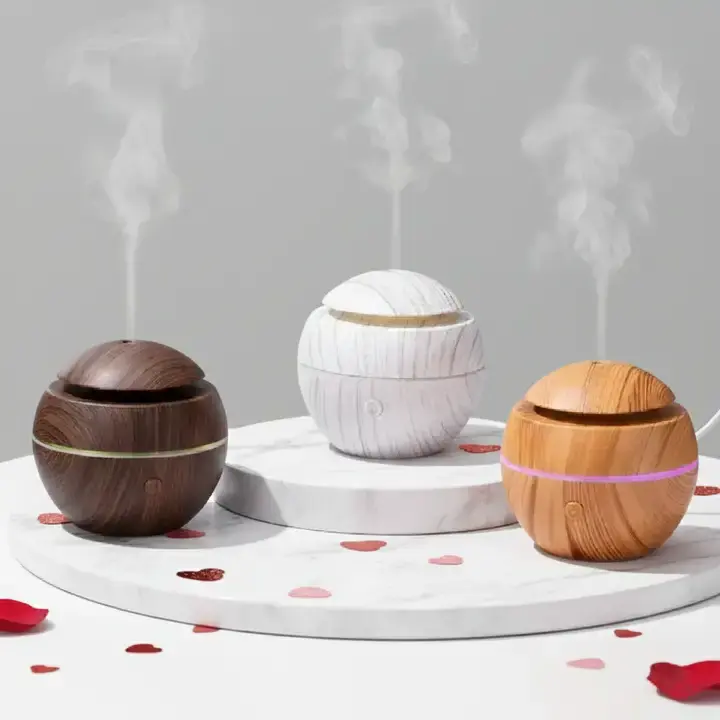 Dark wood, marble, and light wood diffuser variants